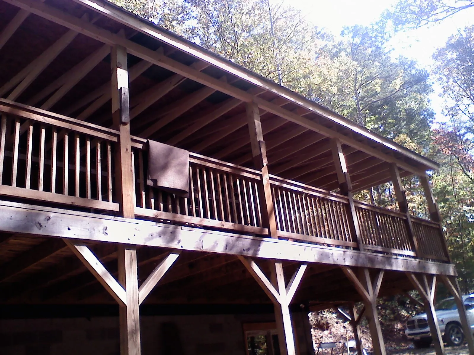 Timber framing under a new elevated porch and deck — Roof Leak Repair in Petersburg by Roofing Brothers